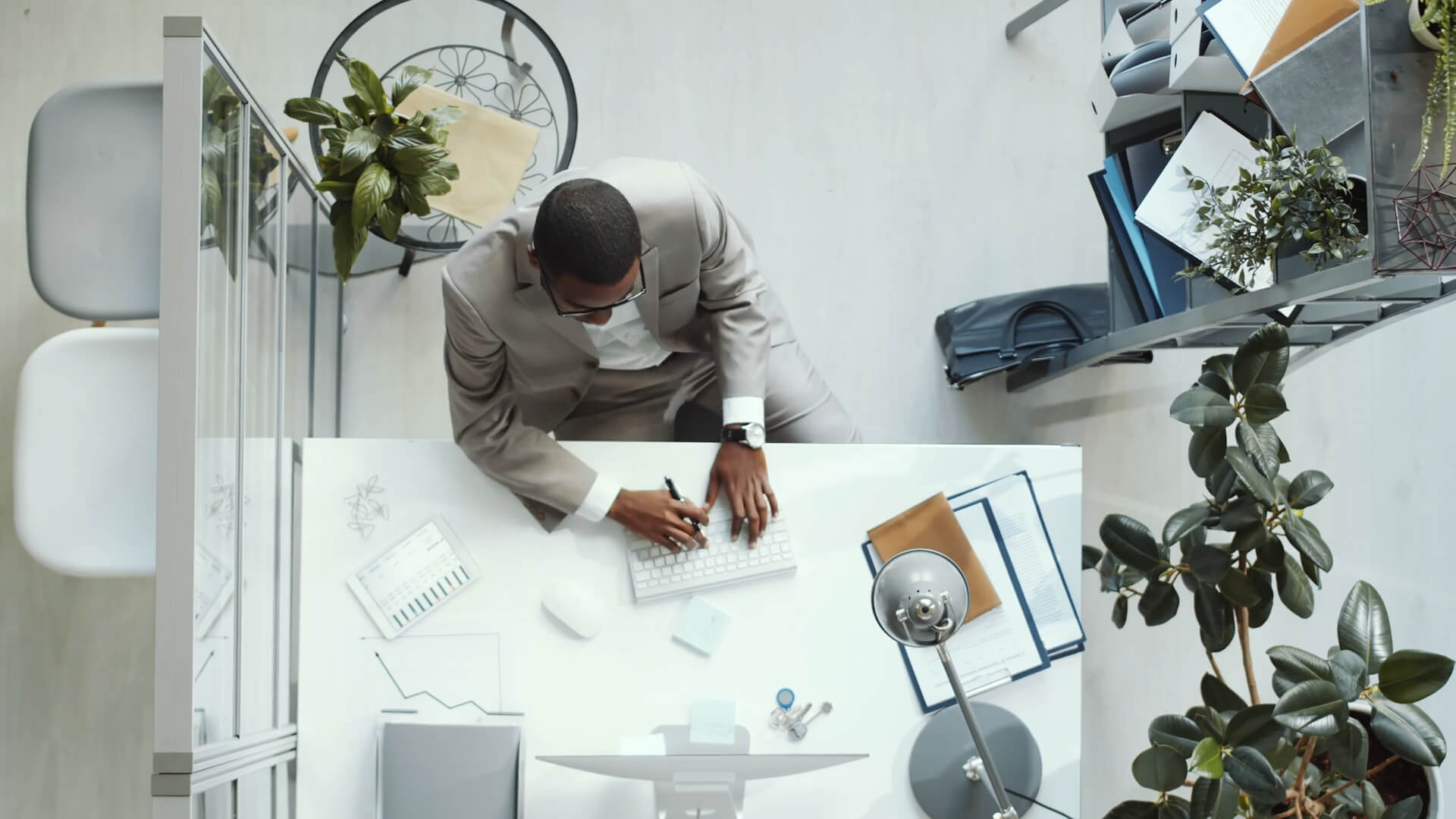 A businessman works in his office